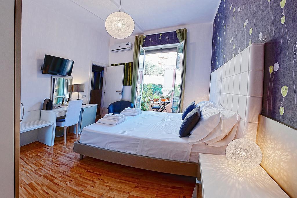 B&B Pellicano Guest House เรจโจ ดี คาลาเบีย ห้อง รูปภาพ